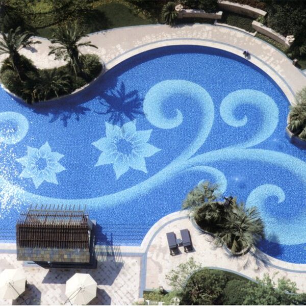 Custom Pools MEC | Graceful glass mosaic scrolls with delicate flowers.