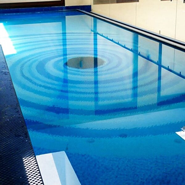 Custom Mosaics by MEC | Whirlpool glass mosaic pool design made with blue & black glass tiles.