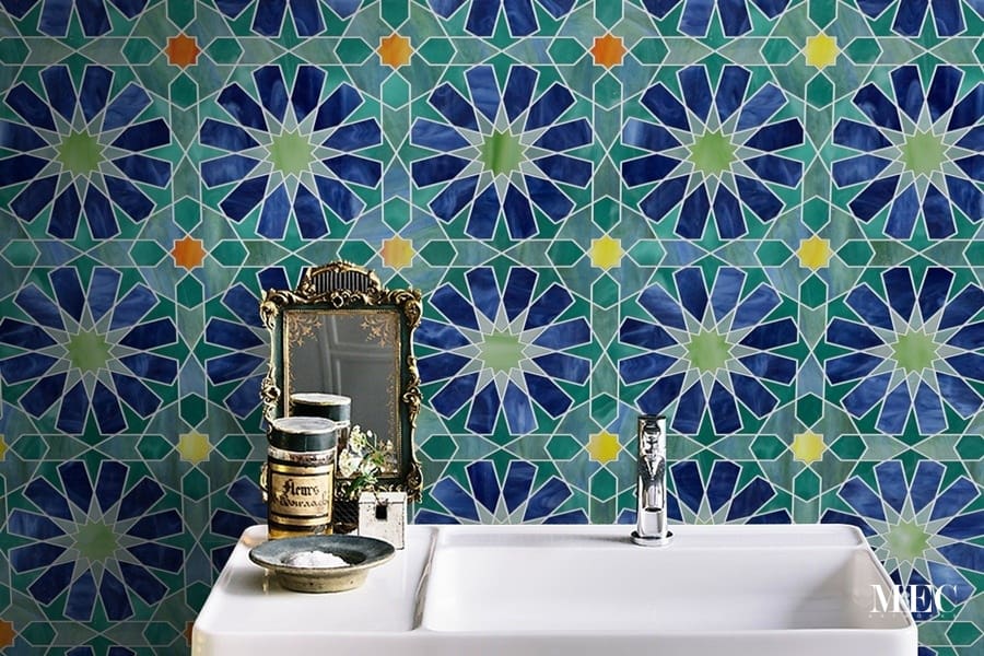 ARYN. Product image showing Jade Glass waterjet cut tiles from Marrakesh collection. Custom blue green geometric Arabesque Moroccan tile design from MEC.