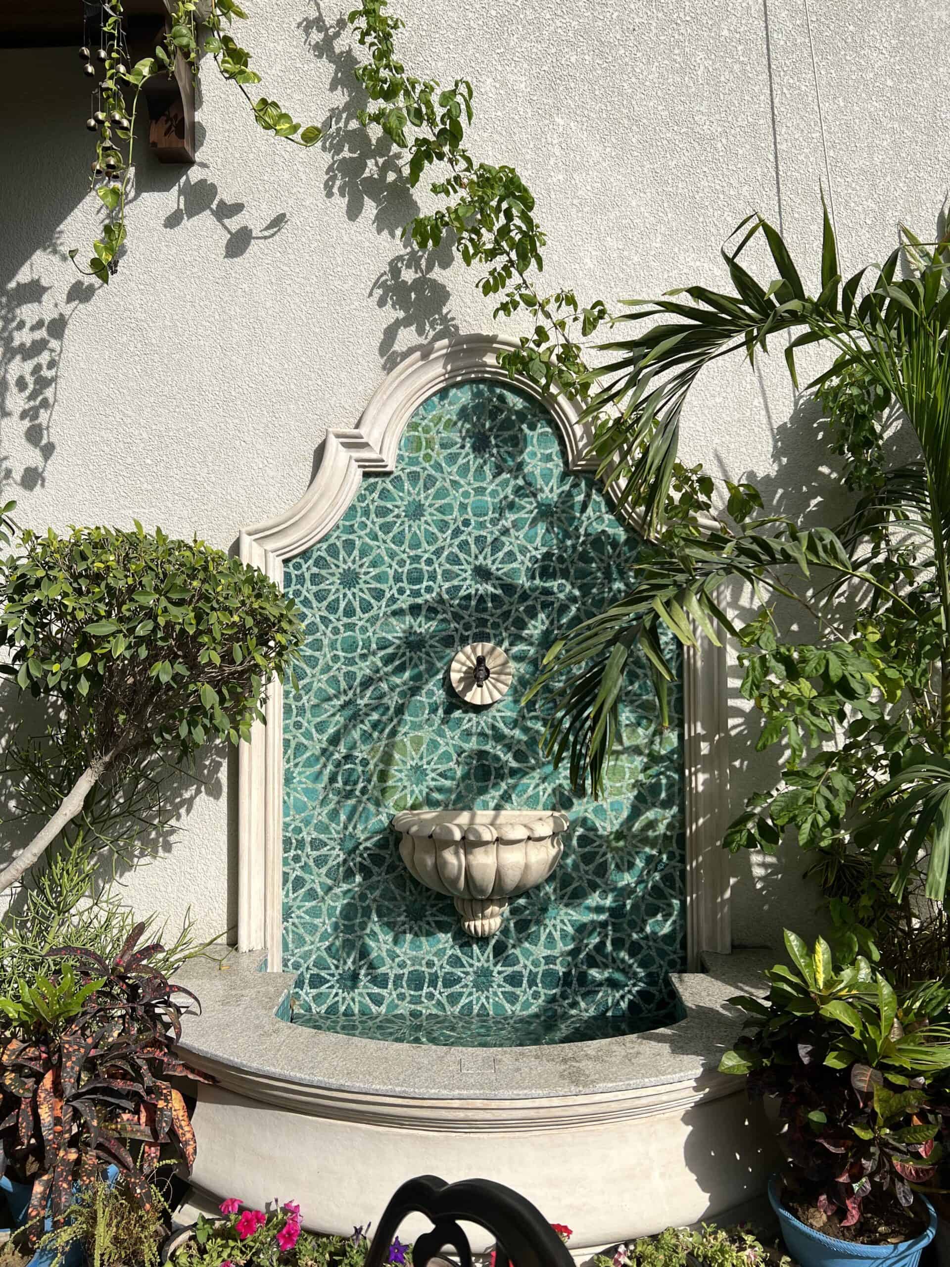 modern ethnic mosaic which displays a Moroccan design made with turquoise mosaic tiles