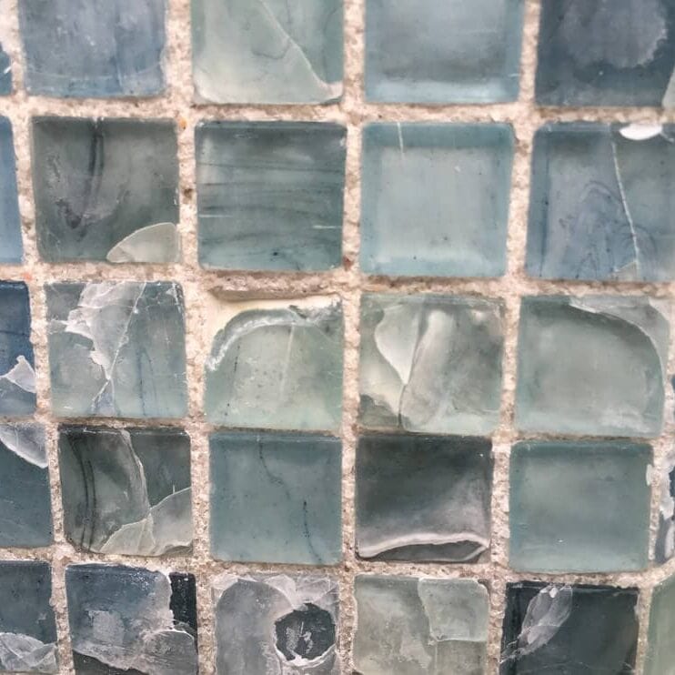cracked swimming pool waterline glass mosaic tiles