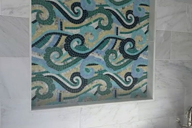 Osalli mosaic by MEC installed in a bathroom wall niche close up. Home Reno Virginia USA