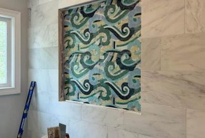 Freshly installed Osalli mosaic by MEC on a bathroom wall niche in Virginia USA